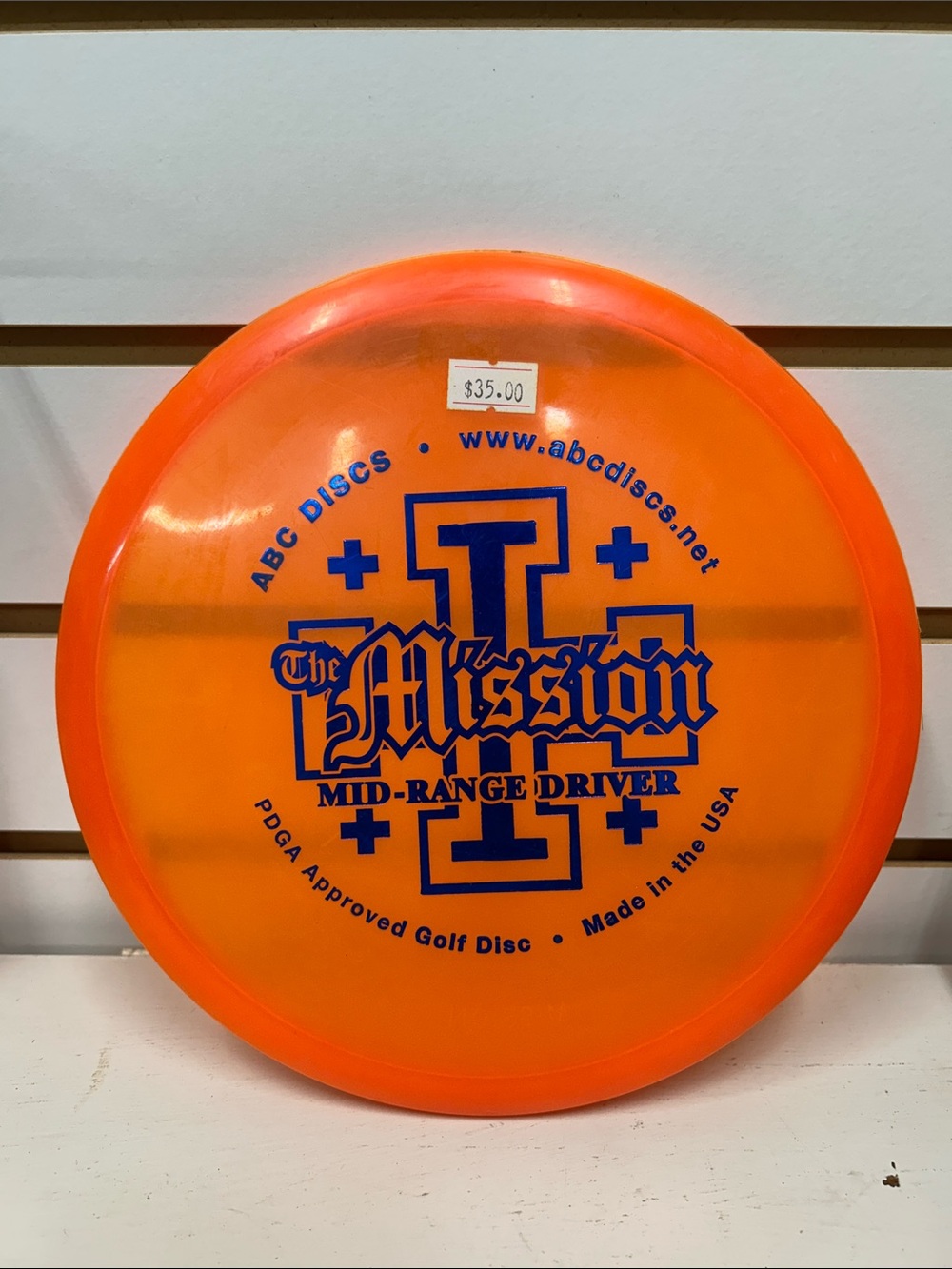 ABC Disc The Mission I Mid-Range Driver Disc - Orange with Blue Stamp
